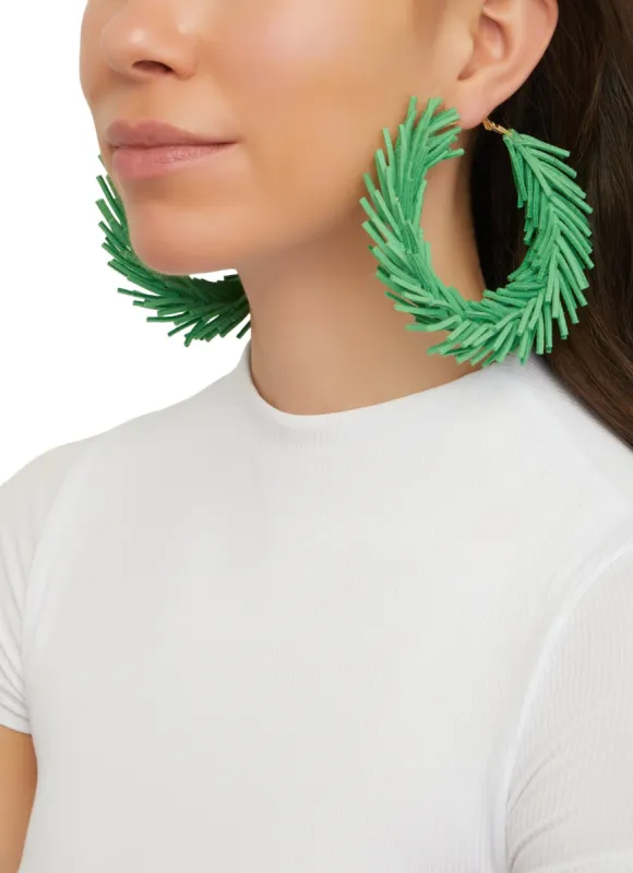 Faux Suede Fringed Hoop Earrings sold by Rainbow