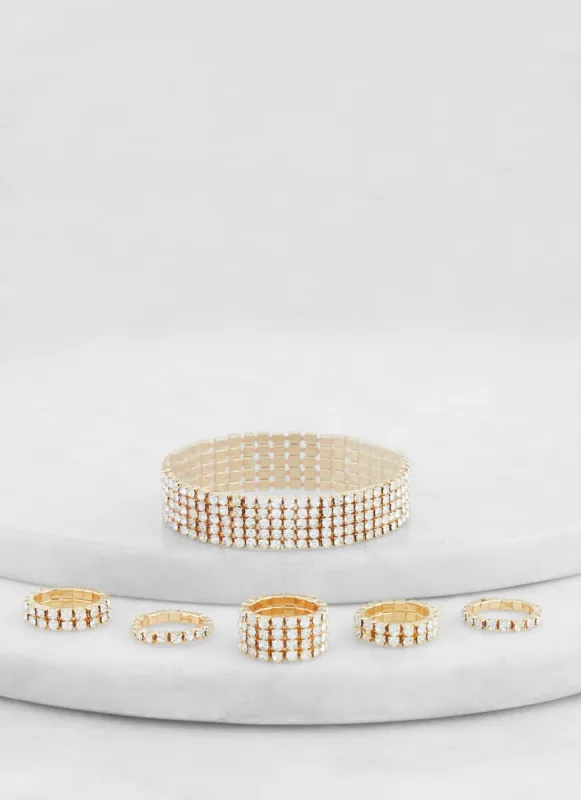 Rhinestone Tennis Bracelet and Assorted Rings sold by Rainbow