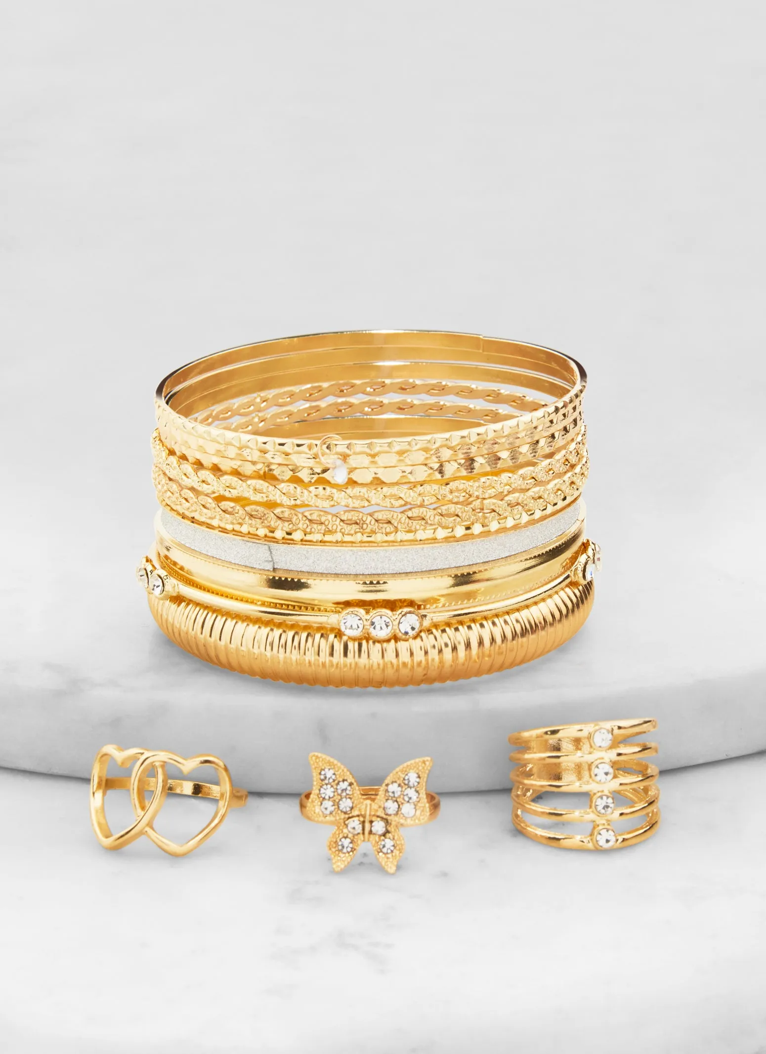 Set of 13 Assorted Bangles with Rings sold by Rainbow