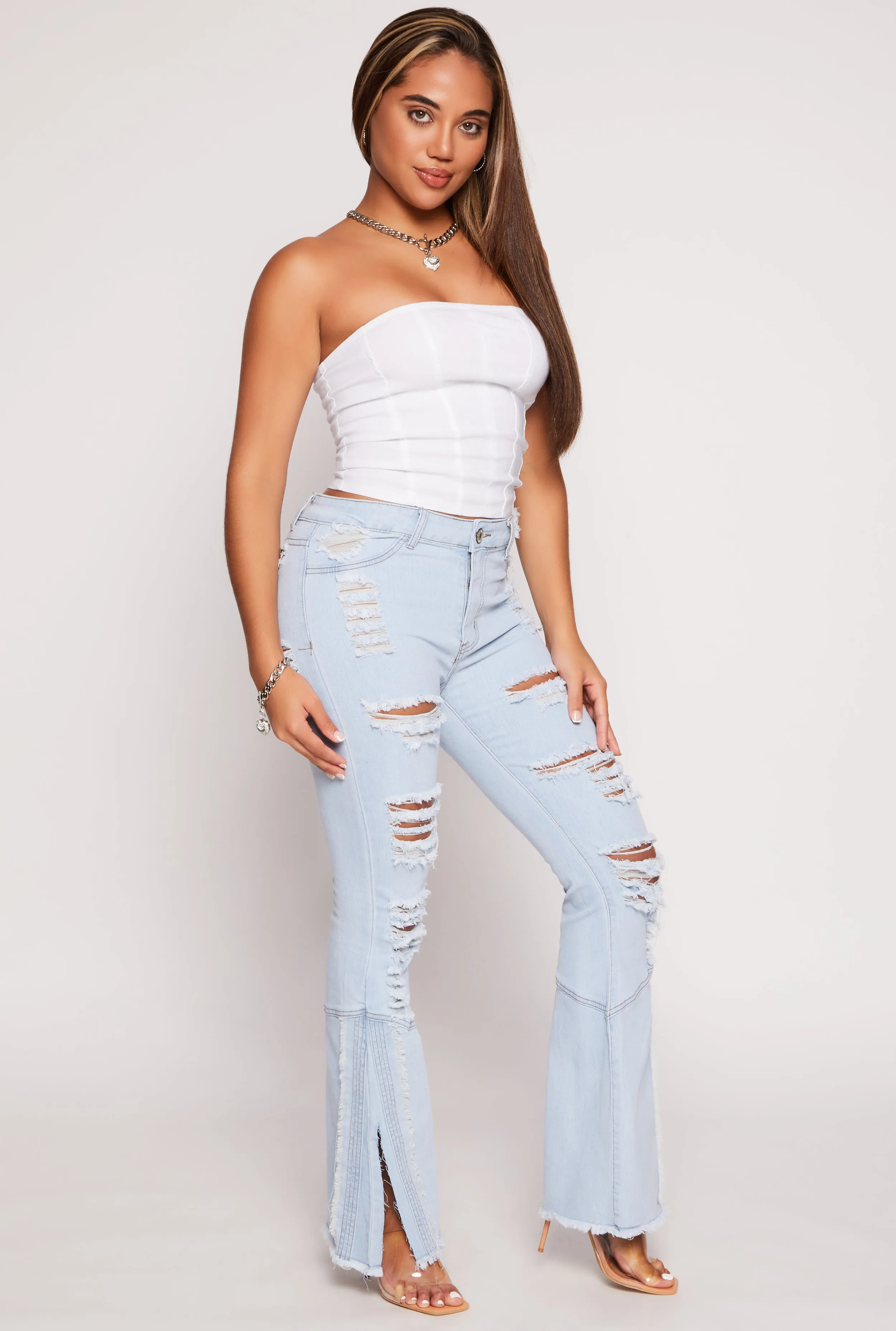 Ripped High Waisted Flare Jeans sold by Rainbow