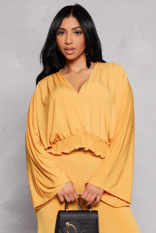 Smocked Hem Bell Sleeve Crop Top sold by Rainbow