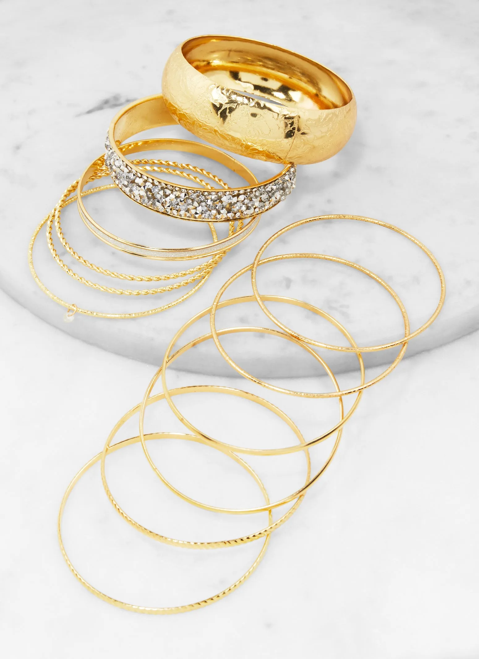 Set of 12 Cubic Zirconia Textured Metallic Bangles sold by Rainbow product image thumbnail 2