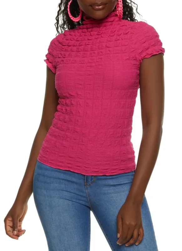 Solid Bubble Knit Mock Neck Top sold by Rainbow