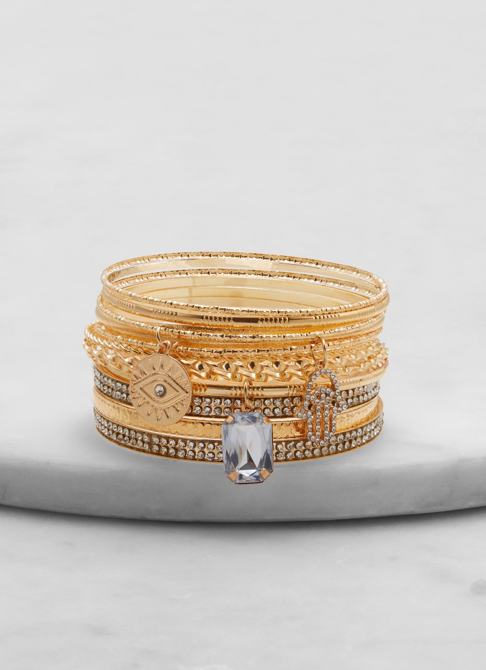 Set of 13 Assorted Metallic Charm Bangles sold by Rainbow