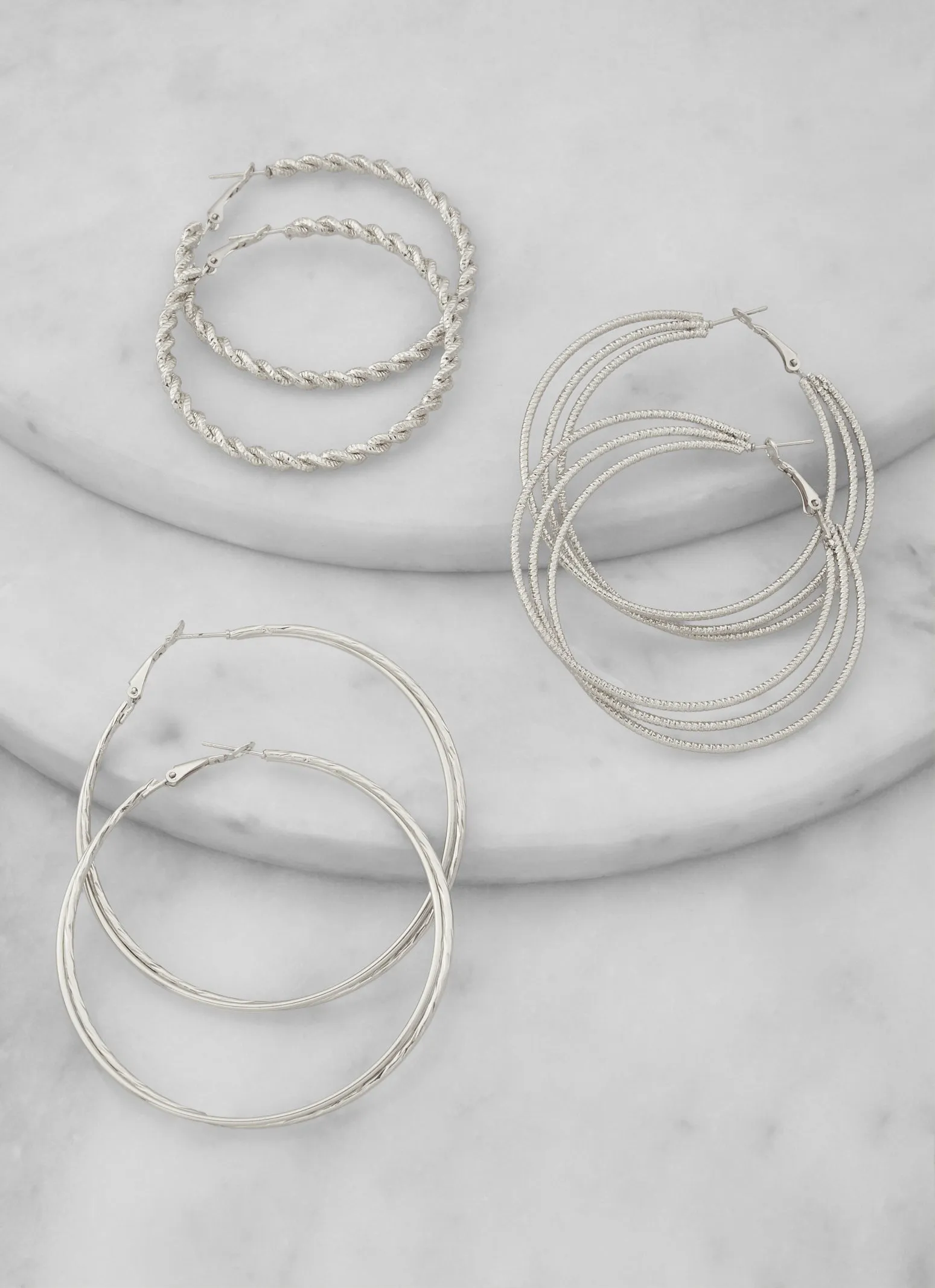 Metallic Assorted Hoop Earrings Trio sold by Rainbow