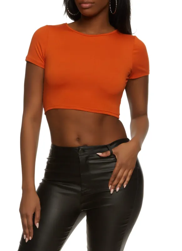 Solid Open Lace Up Back Crop Top sold by Rainbow