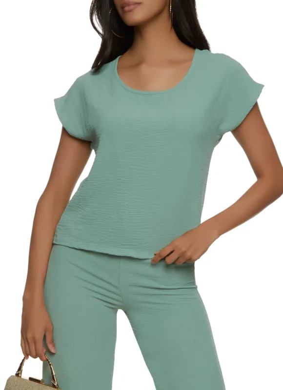 Solid Crepe Knit Crew Neck Top sold by Rainbow