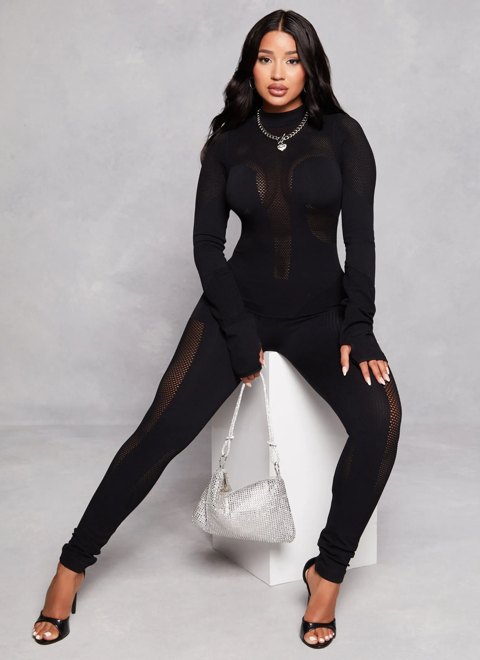 Seamless Ribbed Fishnet Detail Long Sleeve Jumpsuit sold by Rainbow