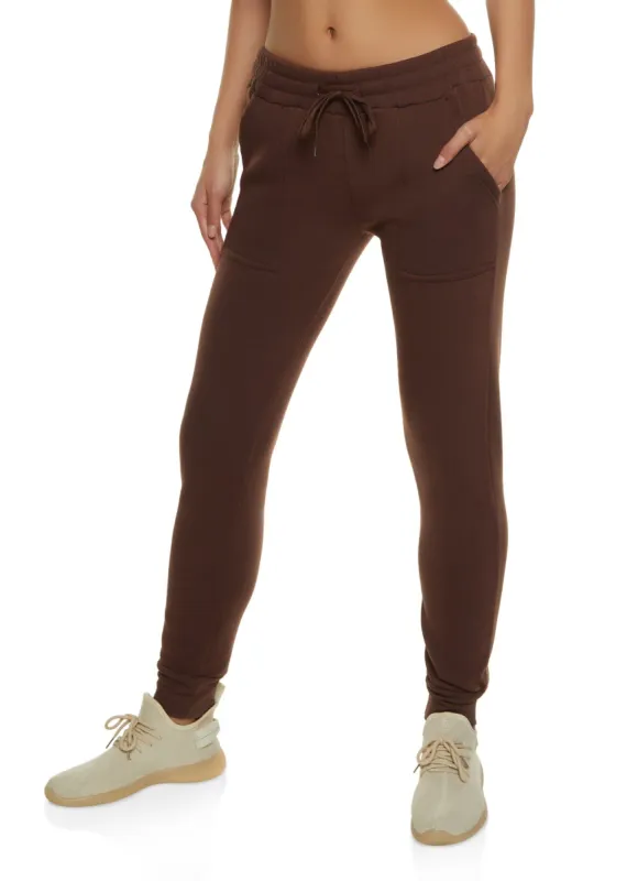 Solid Fleece Drawstring Joggers sold by Rainbow