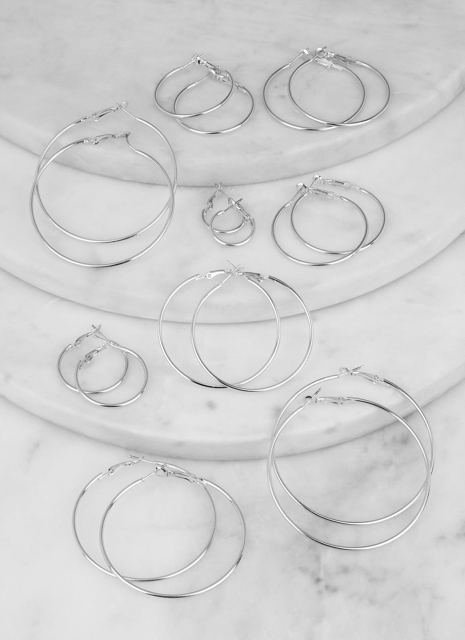 Metallic Assorted Hoop Earrings Set of 9 sold by Rainbow