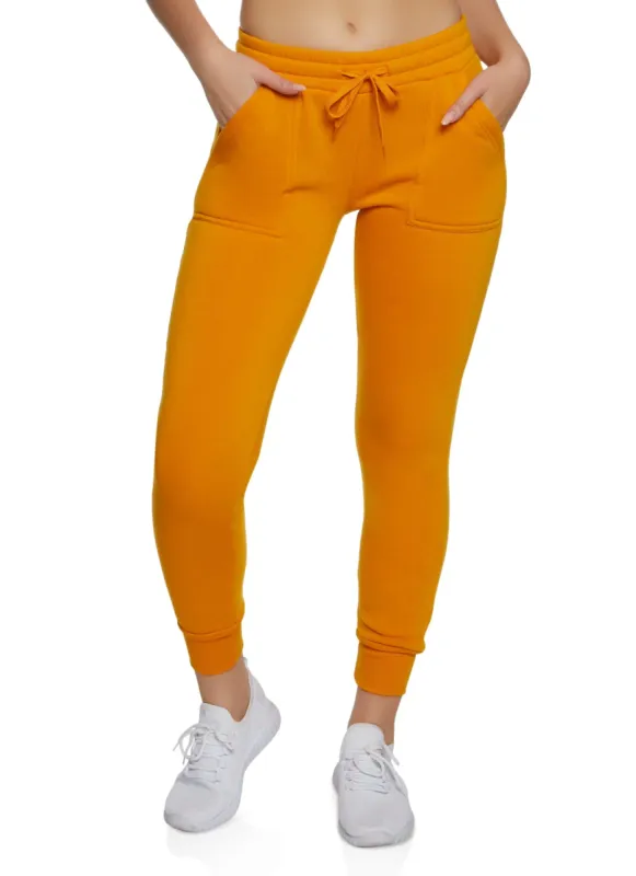 Solid Fleece Drawstring Joggers sold by Rainbow