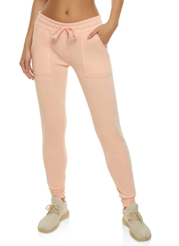 Solid Fleece Drawstring Joggers sold by Rainbow