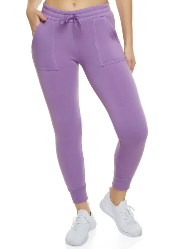 Solid Fleece Drawstring Joggers sold by Rainbow