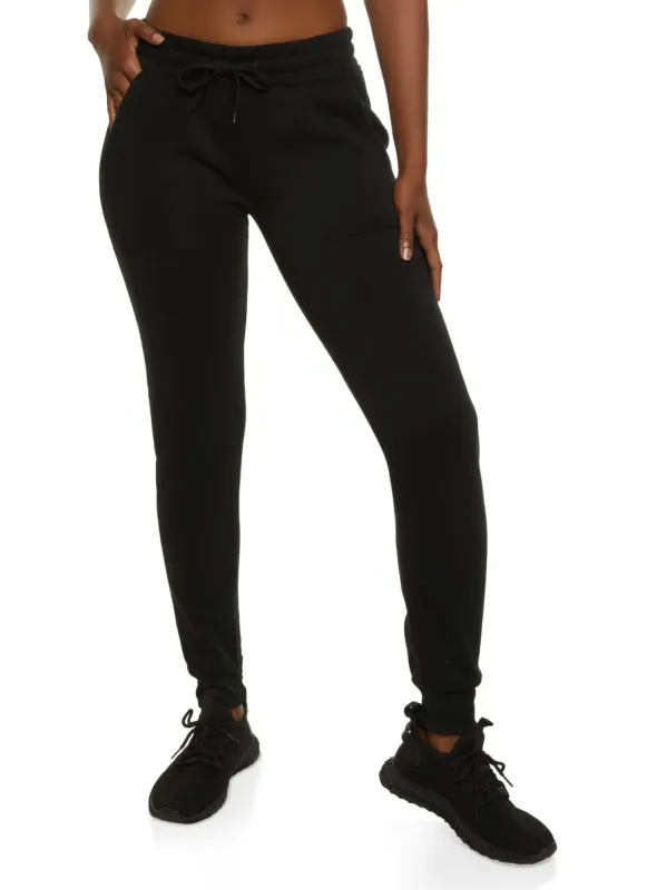 Solid Fleece Drawstring Joggers sold by Rainbow