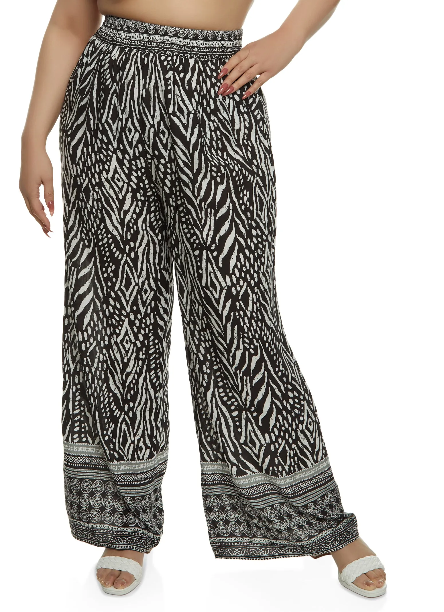 Plus Size Smocked Waist Printed Wide Leg Pants sold by Rainbow
