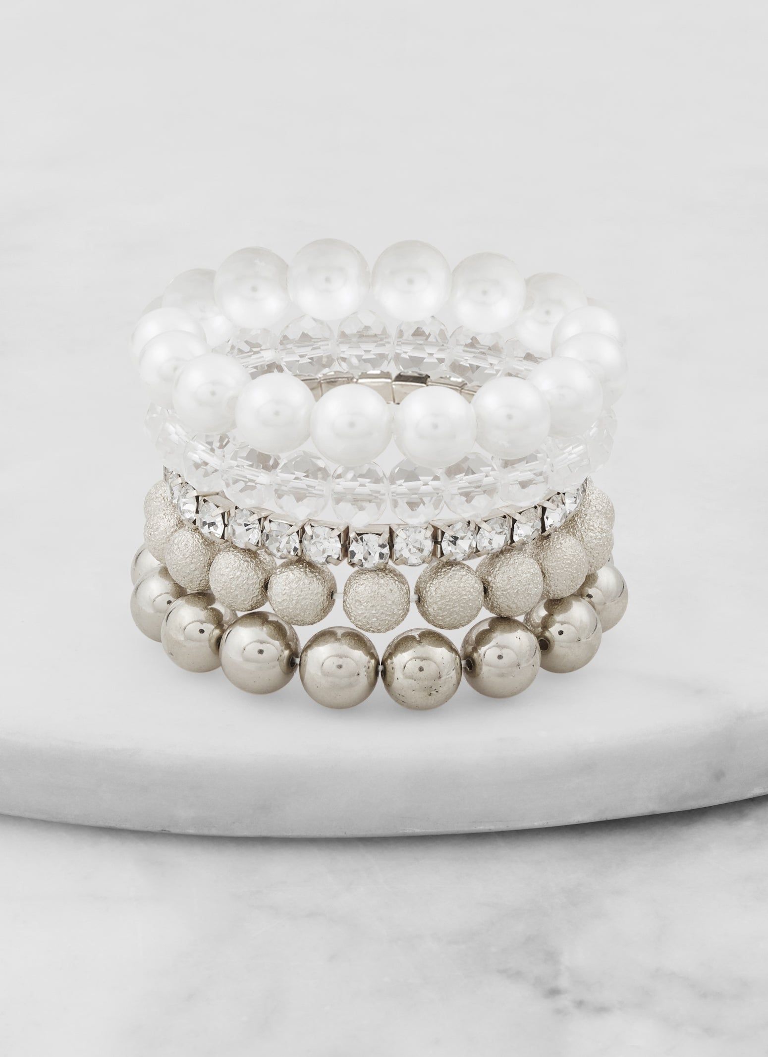 Set of 5 Assorted Beaded Stretch Bracelets sold by Rainbow