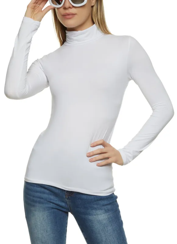Solid Turleneck Top sold by Rainbow