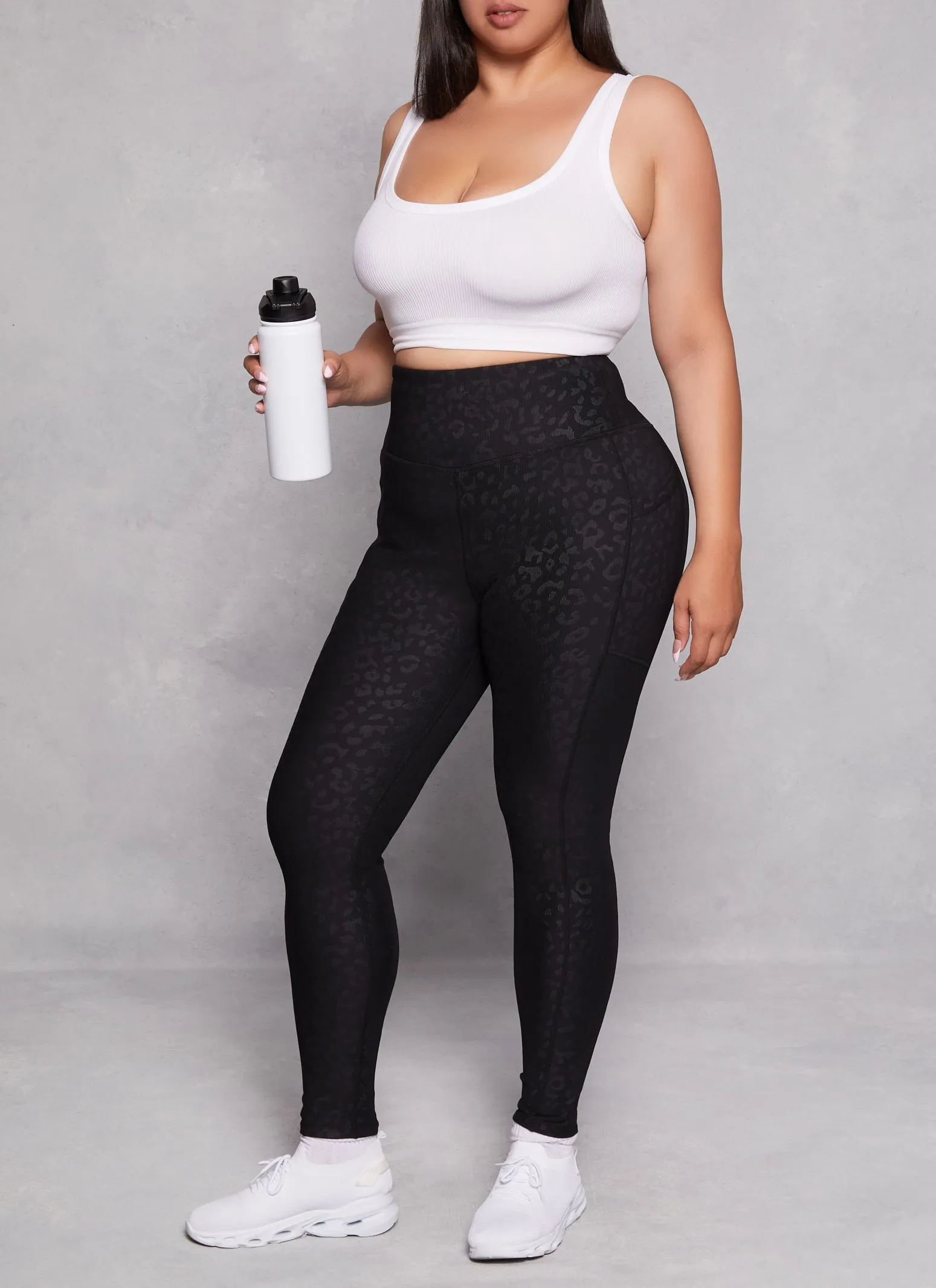 Plus Size Animal Print Cell Phone Pocket Leggings sold by Rainbow