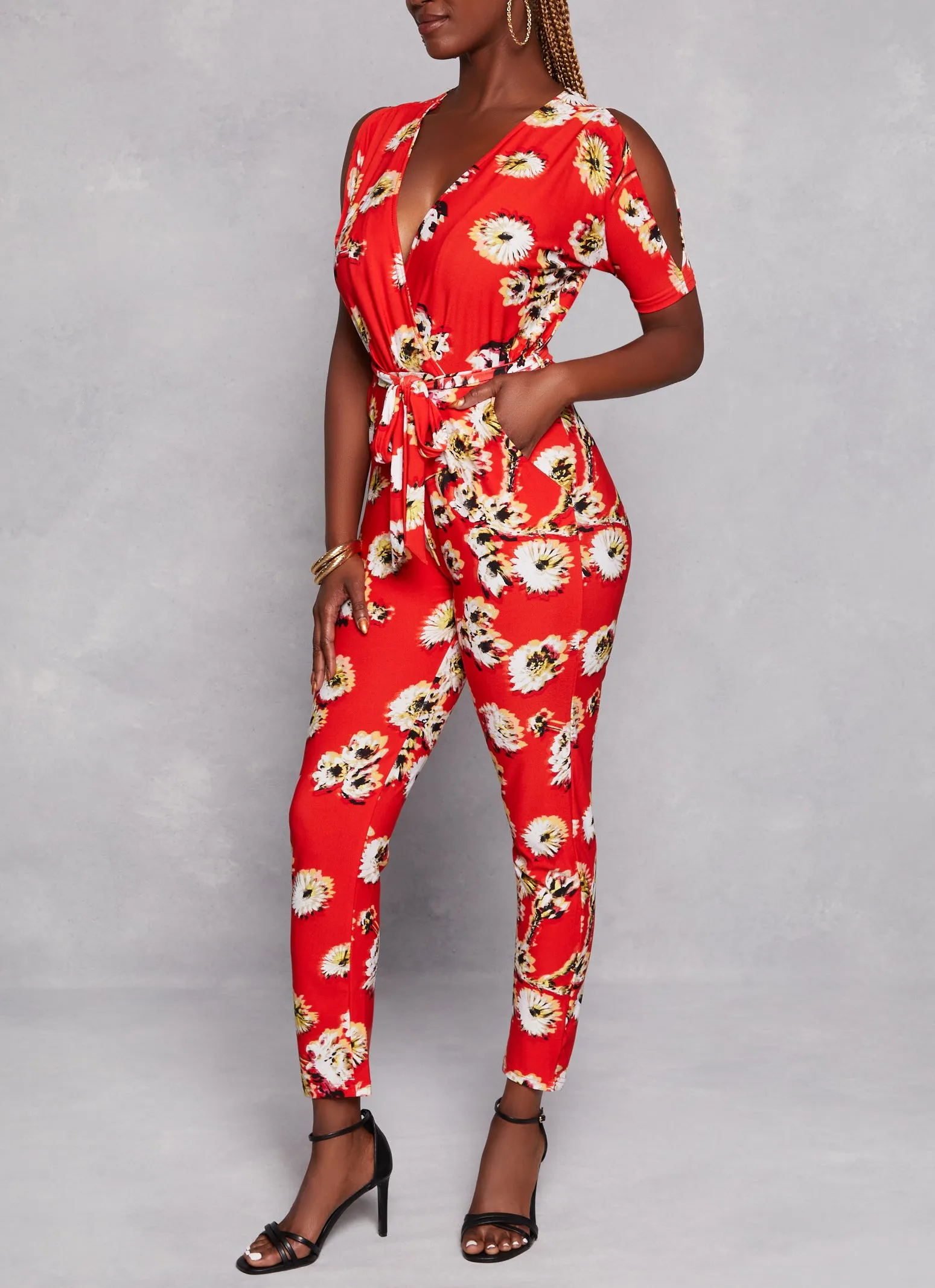 Patterned Cold Shoulder Jumpsuit sold by Rainbow