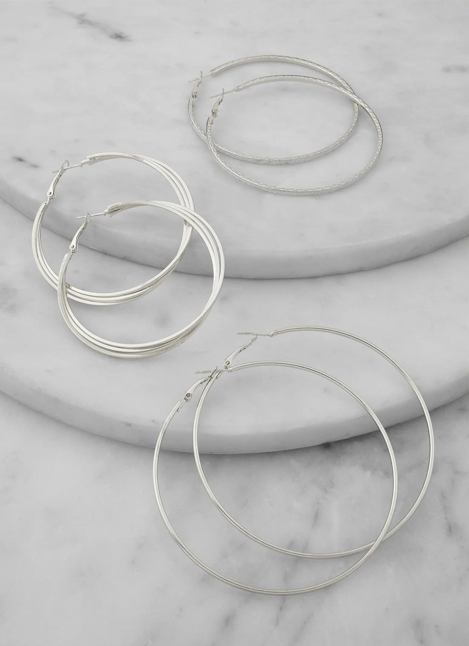 Assorted Metallic Hoop Earring Trio sold by Rainbow