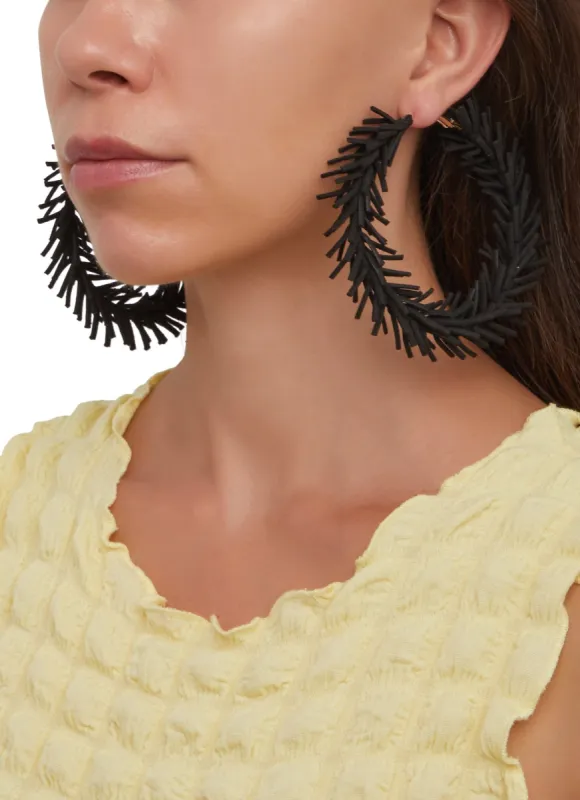 Faux Suede Fringed Hoop Earrings sold by Rainbow