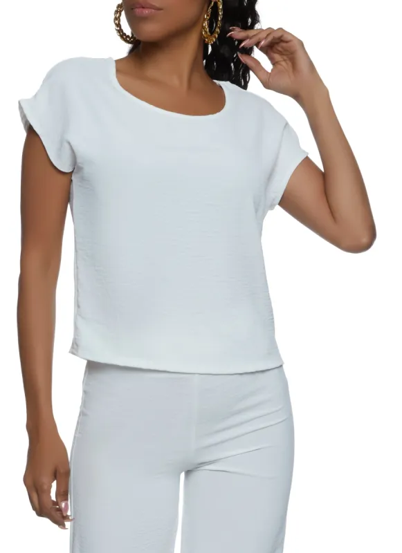 Solid Crepe Knit Crew Neck Top sold by Rainbow