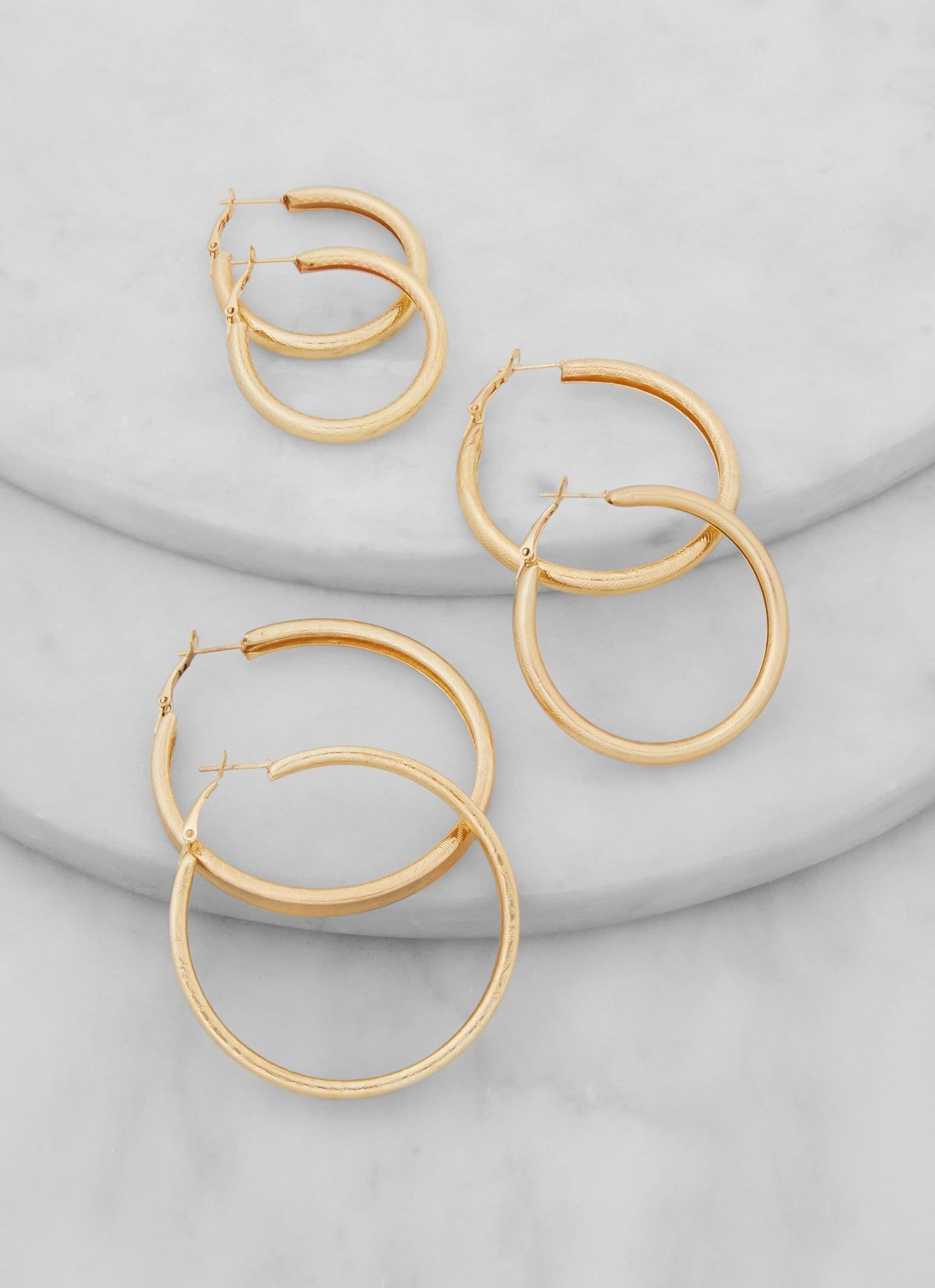 3 Pack Assorted Chunky Hoop Earrings sold by Rainbow
