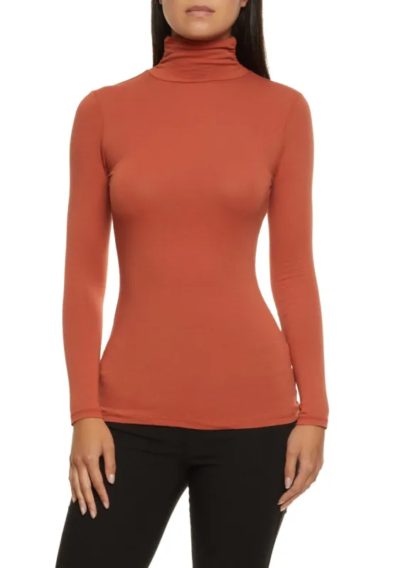 Ruched Long Sleeve Turtleneck Top sold by Rainbow