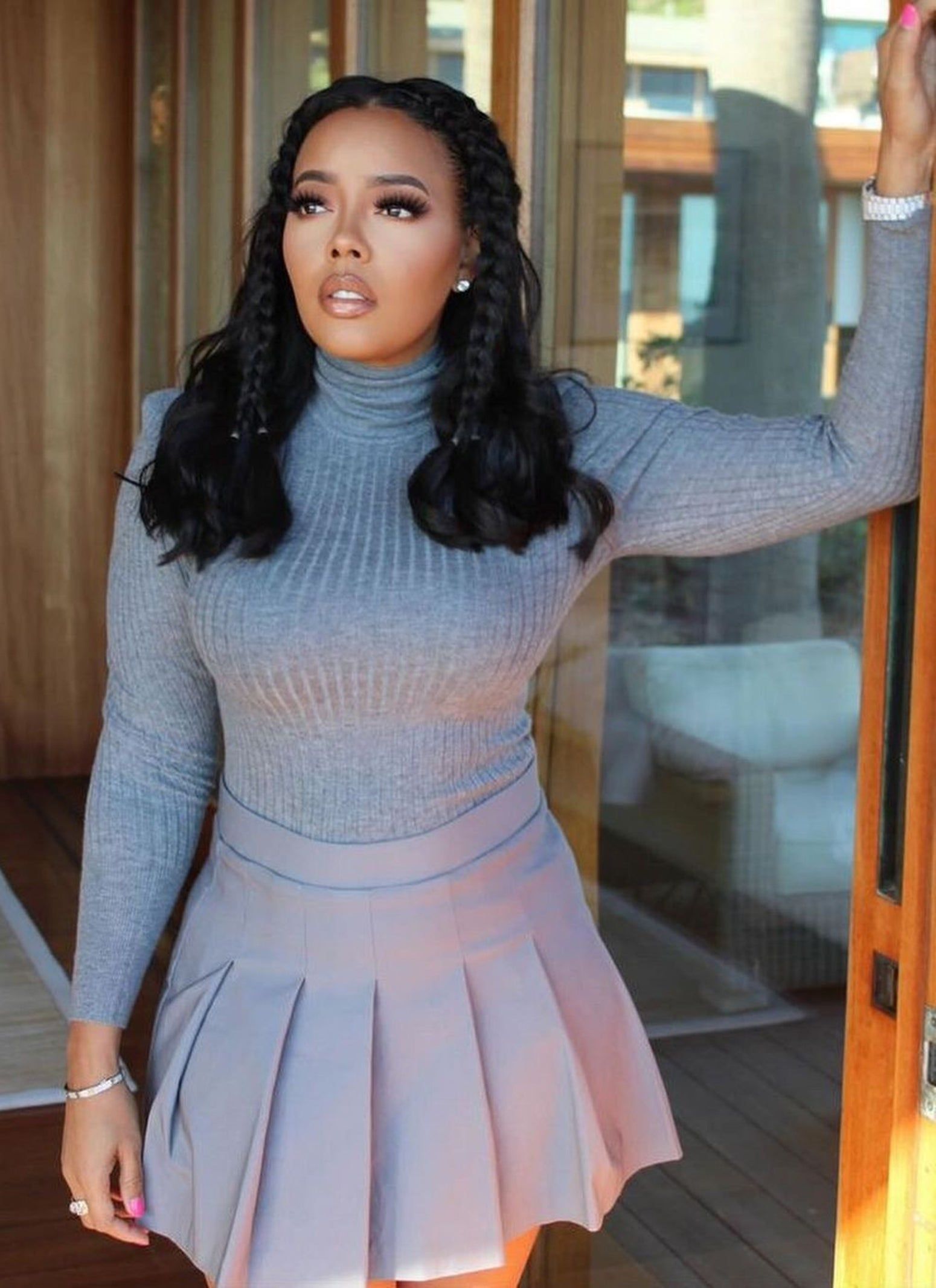 Solid Pleated Mini Skirt sold by Rainbow