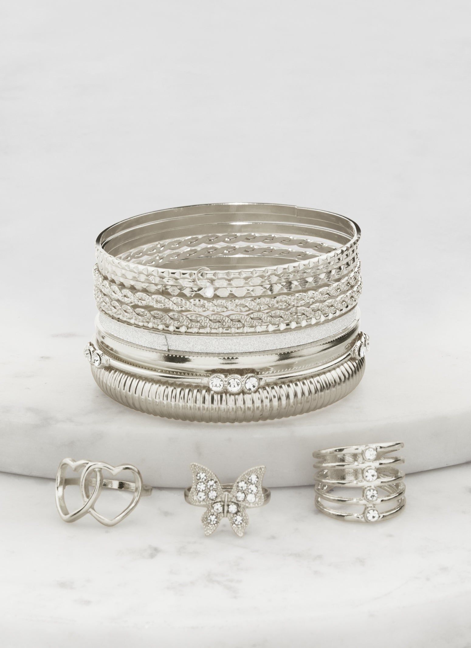 Set of 13 Assorted Bangles with Rings sold by Rainbow