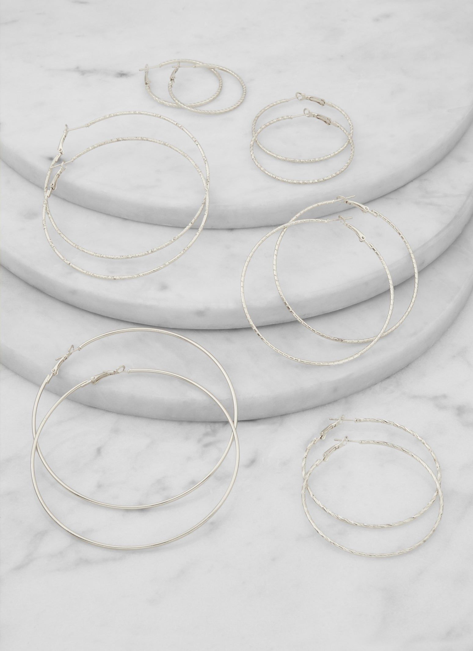 Textured Metallic Hoop Earrings Set of 6 sold by Rainbow