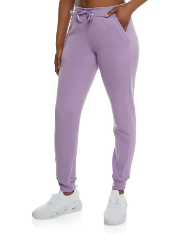 Fleece Pocket Drawstring Joggers sold by Rainbow