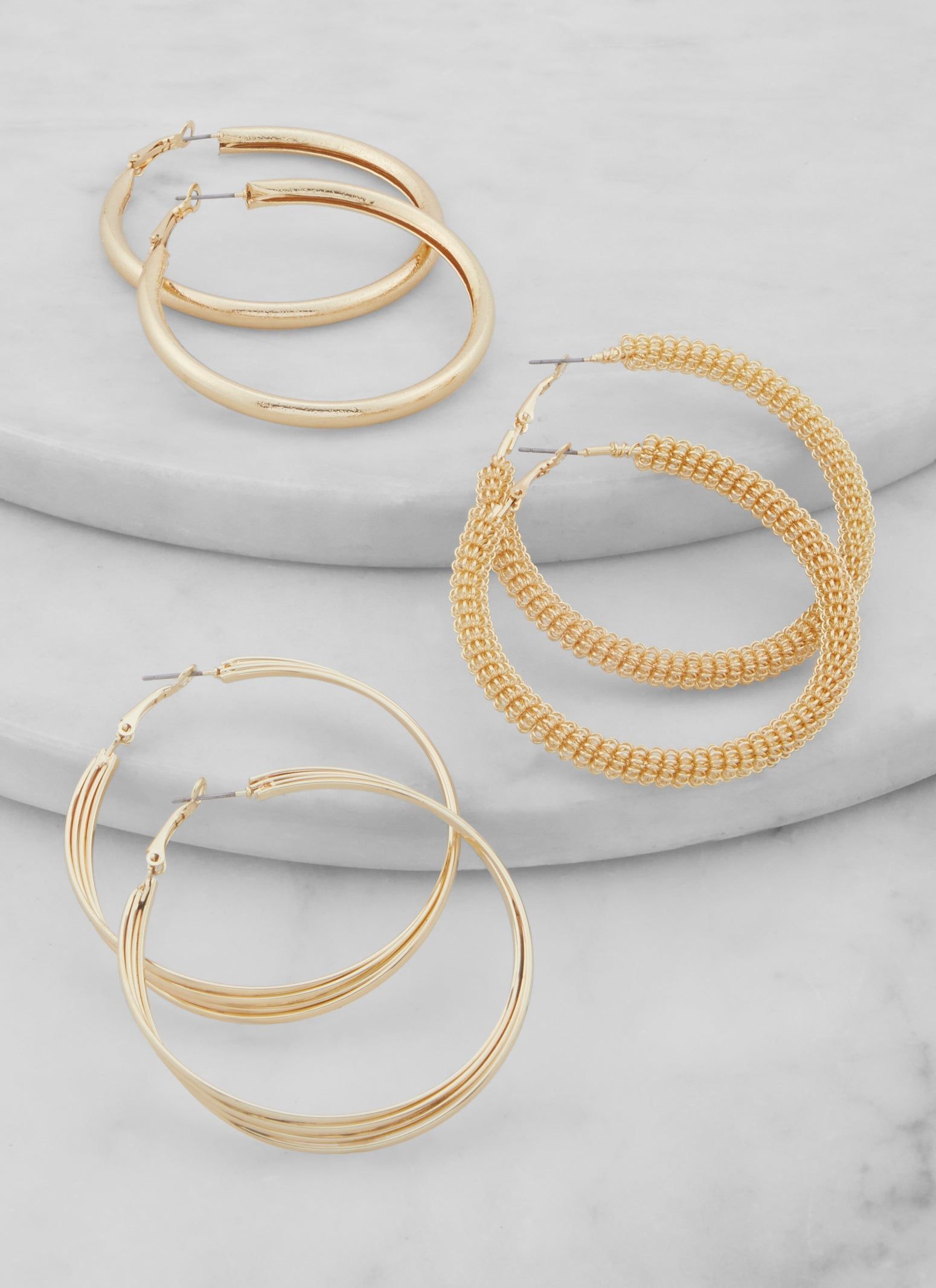 Textured Metallic Hoop Earrings Trio sold by Rainbow