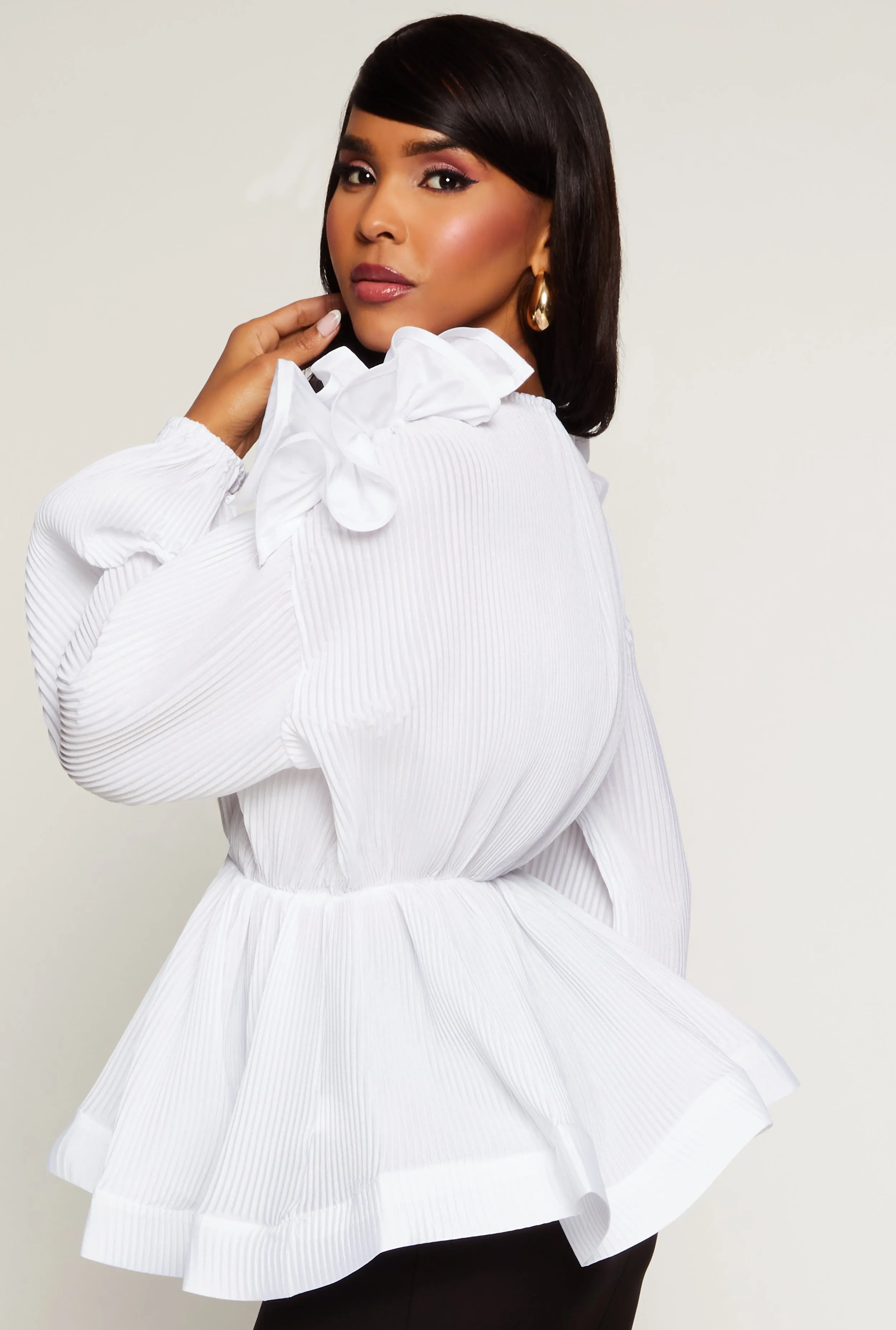 Plisse Abstract Sleeve Detail Peplum Blouse sold by Rainbow product image thumbnail 3