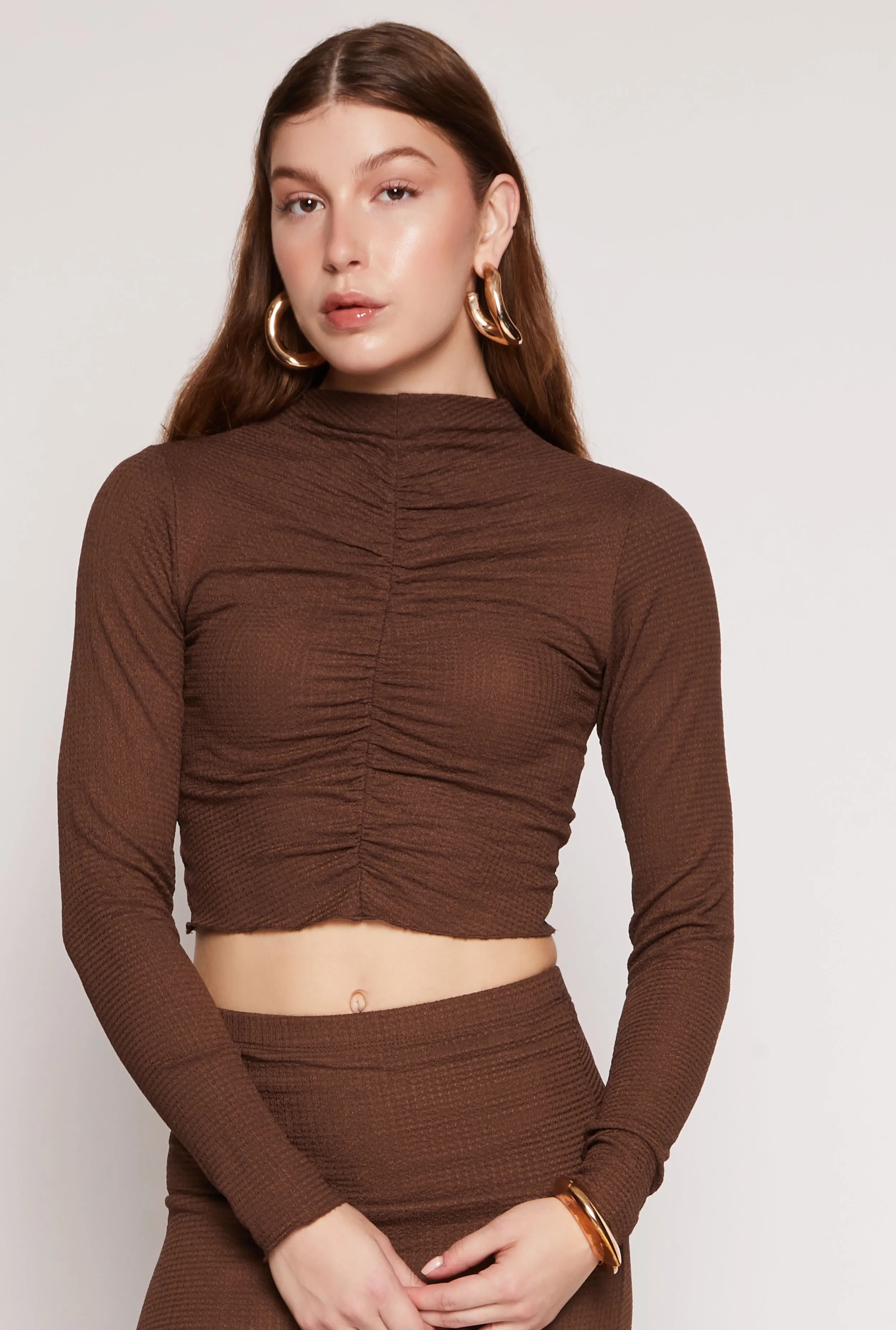 Almost Famous Ruched Long Sleeve Crop Top sold by Rainbow