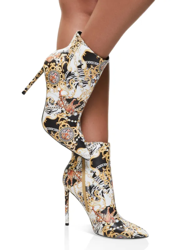 Pointed Toe Ultra High Heel Booties sold by Rainbow