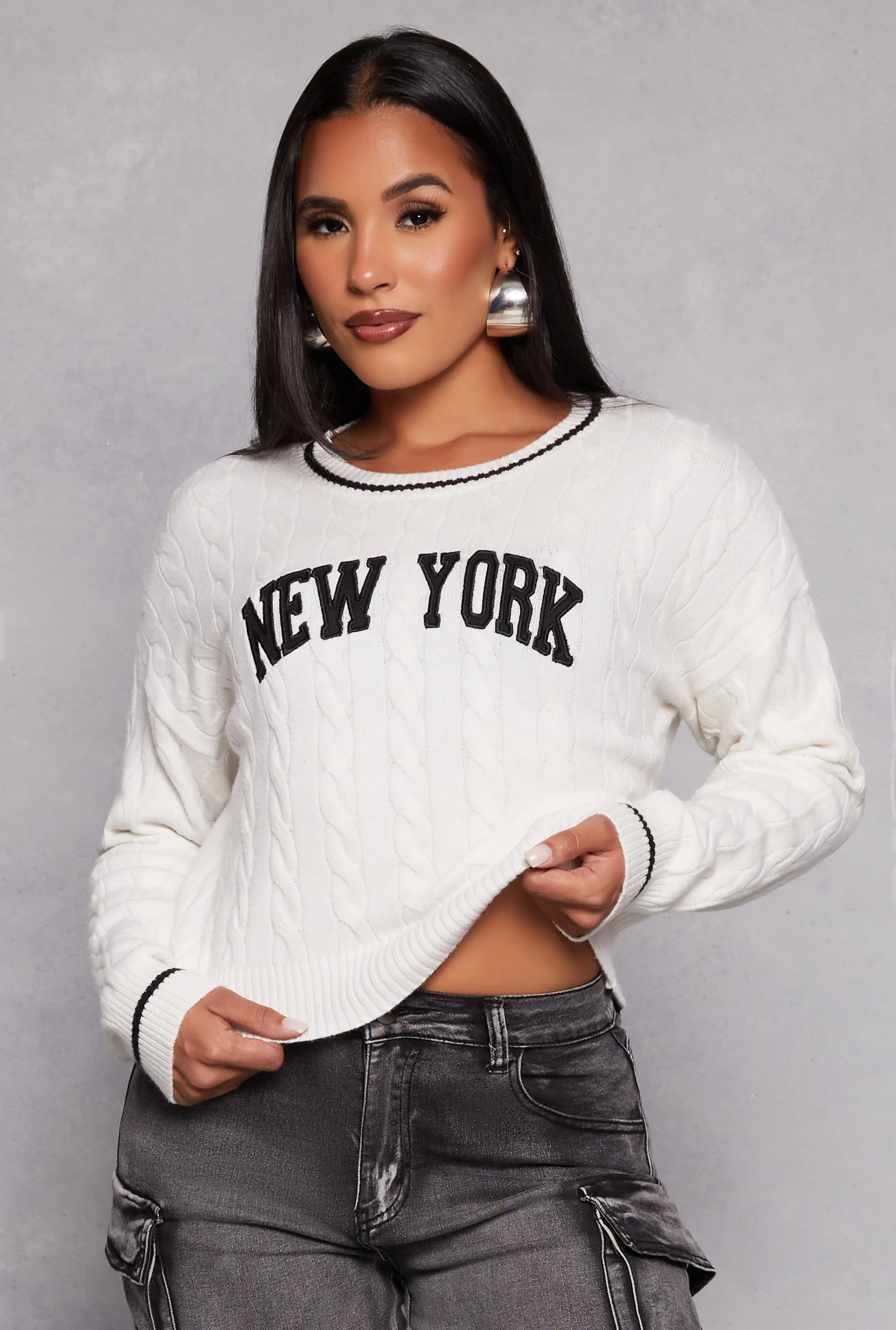 Almost Famous New York Cable Knit Graphic Sweater sold by Rainbow