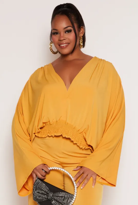 Plus Size Smocked Hem Bell Sleeve Blouse sold by Rainbow