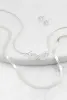 Infinity Charm Herringbone Necklace and Stud Earrings sold by Rainbow