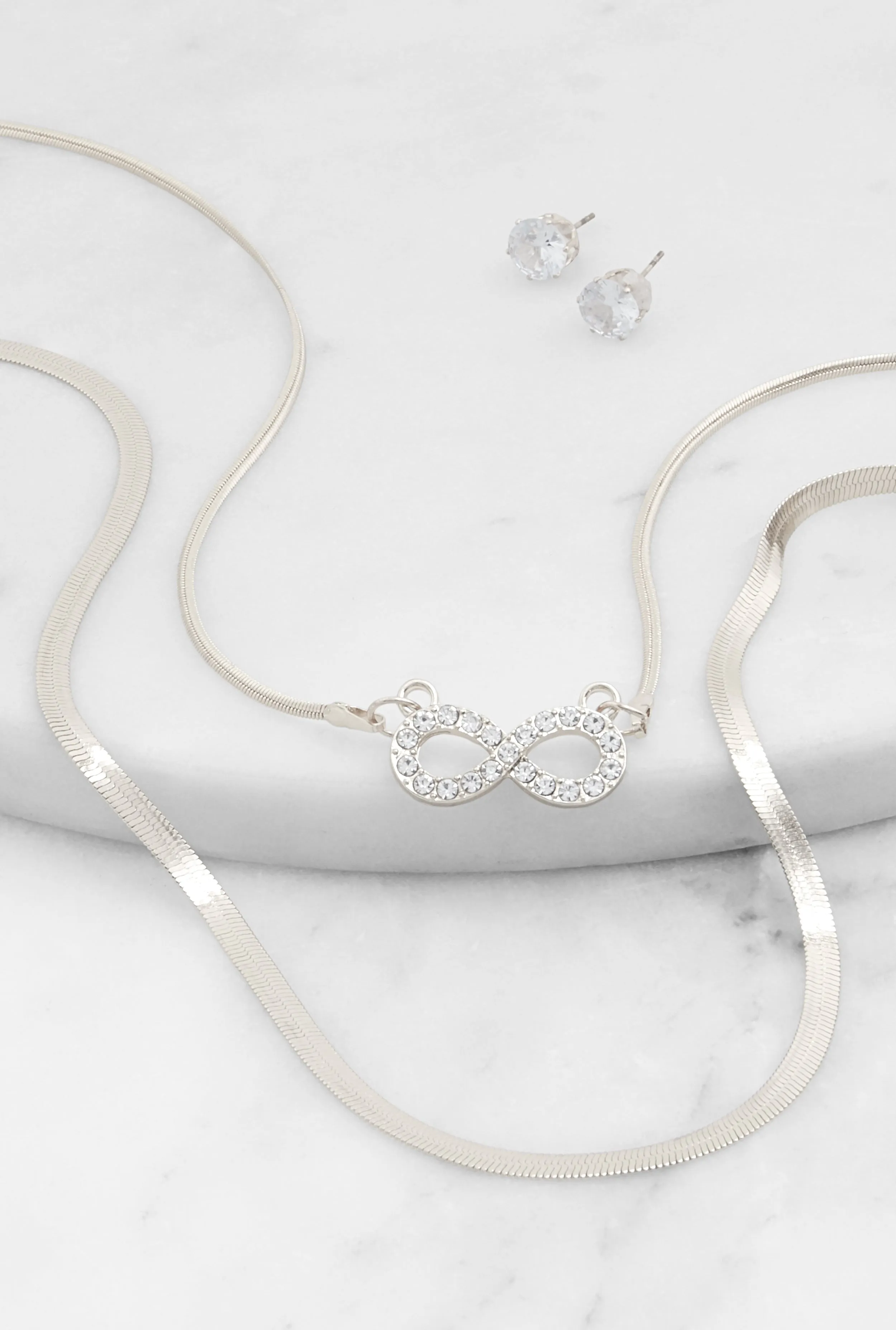 Infinity Charm Herringbone Necklace and Stud Earrings sold by Rainbow product image thumbnail 2