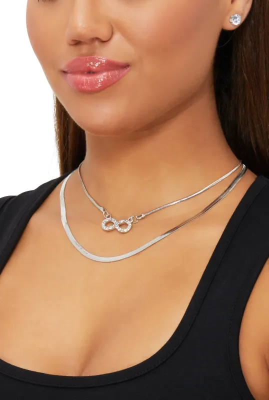 Infinity Charm Herringbone Necklace and Stud Earrings sold by Rainbow