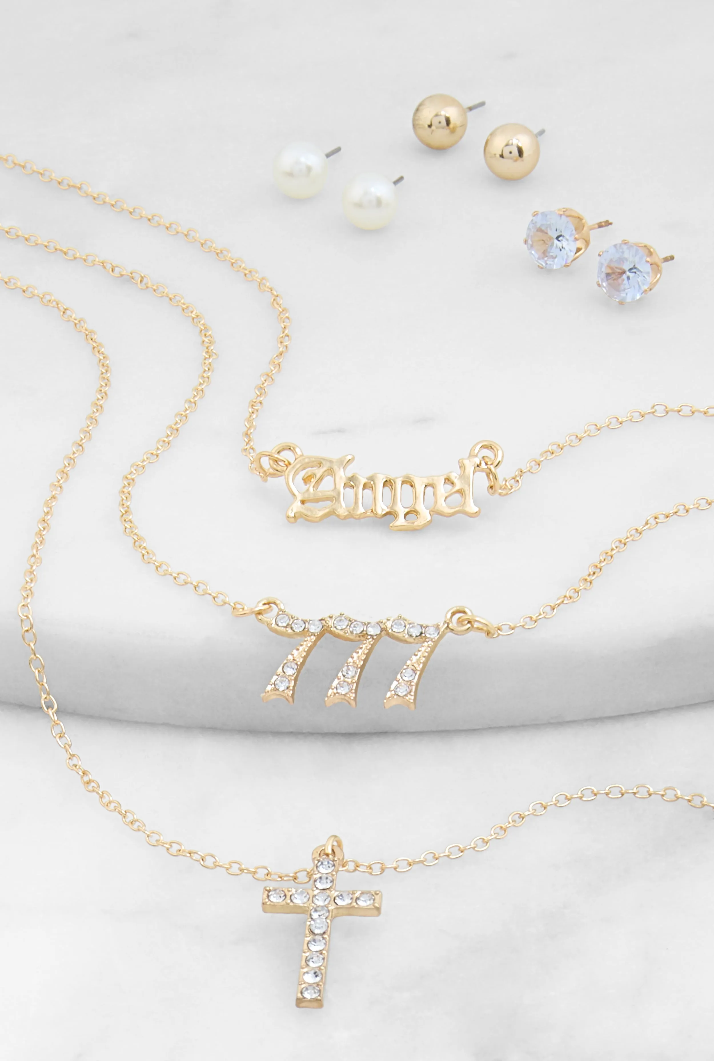 Angel 777 Cross Charm Necklace with Stud Earring Trio sold by Rainbow