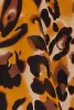 Plus Size Animal Print Tie Waist Top sold by Rainbow