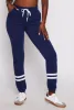 Fleece Lined Varsity Stripe Sweatpants sold by Rainbow