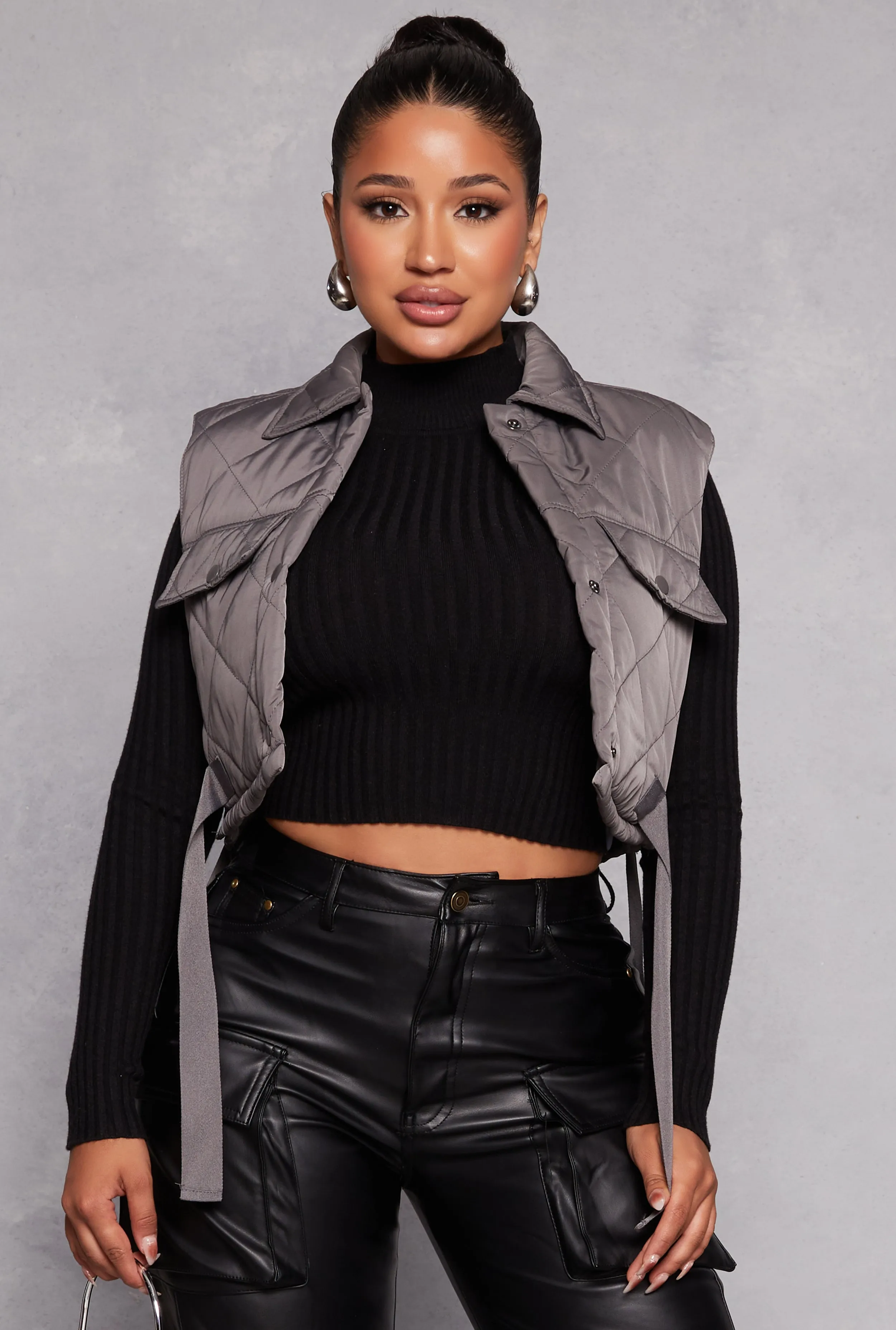 Almost Famous Quilted Snap Button Front Vest sold by Rainbow