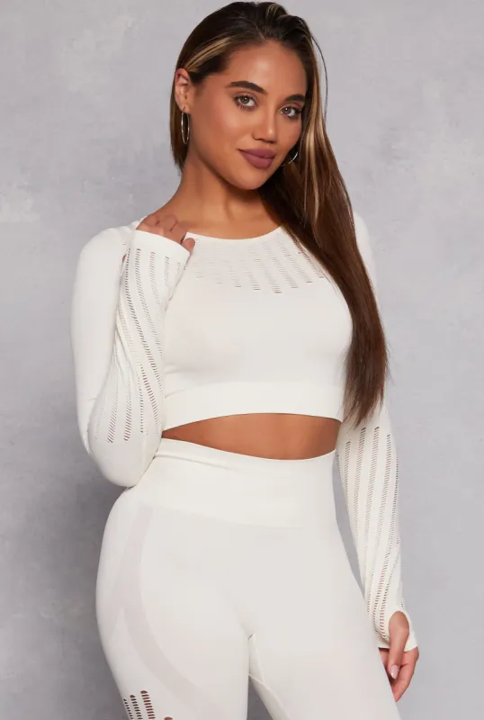 Seamless Laser Cut Long Sleeve Crop Top sold by Rainbow