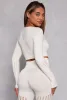 Seamless Laser Cut Long Sleeve Crop Top sold by Rainbow