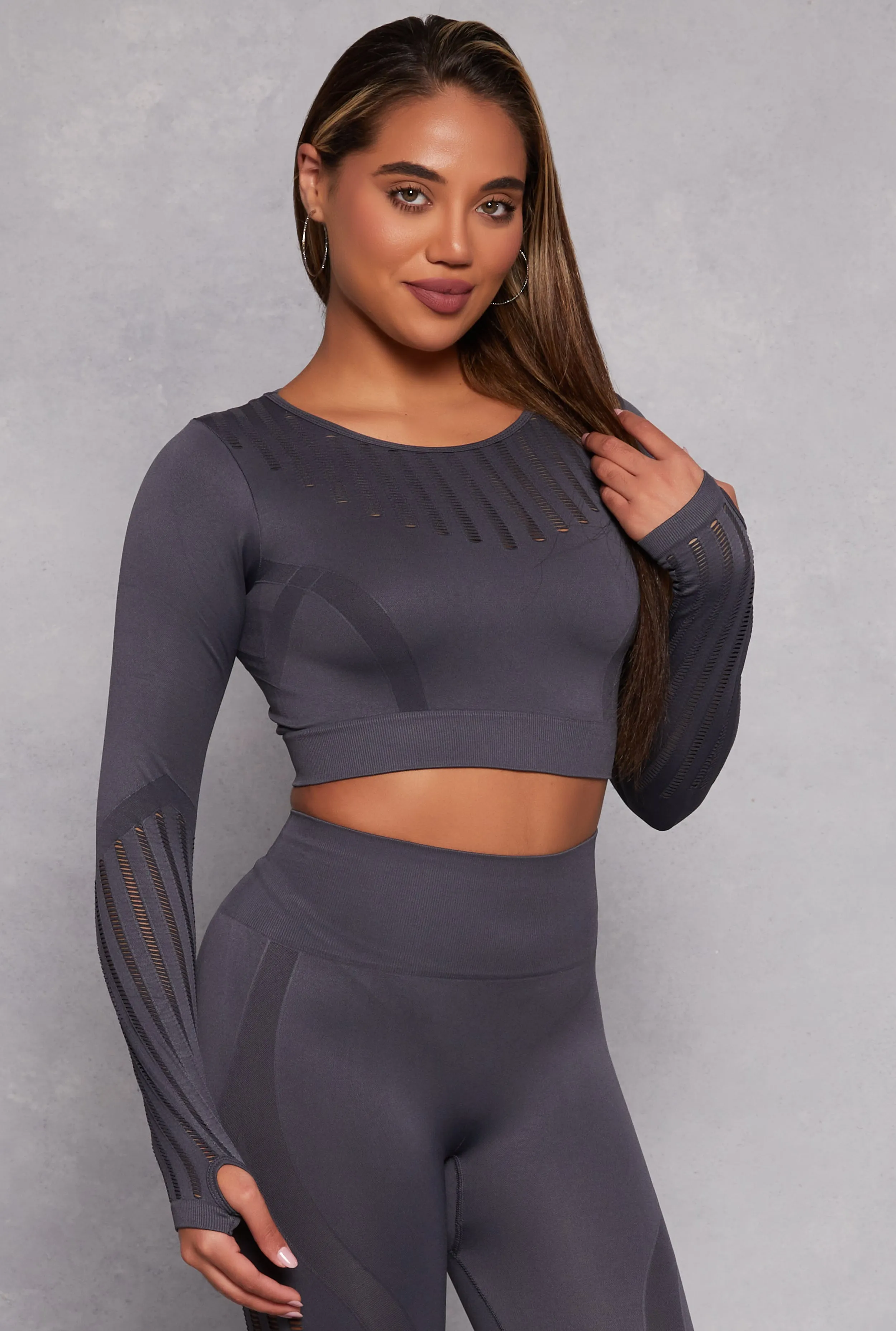 Seamless Laser Cut Long Sleeve Crop Top sold by Rainbow