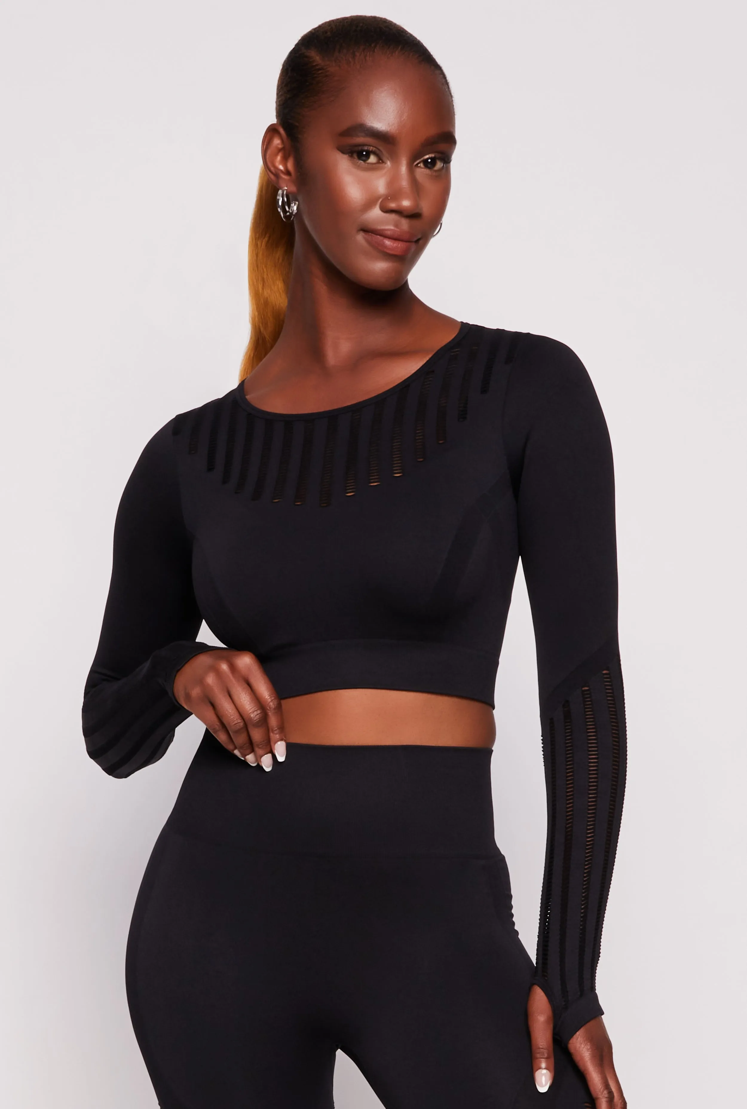 Seamless Laser Cut Long Sleeve Crop Top sold by Rainbow