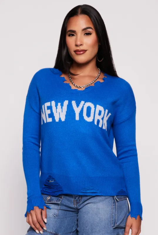 New York Graphic Distressed V Neck Sweater sold by Rainbow